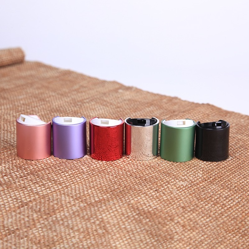 Chrome metallic cosmetic bottle disc top cap