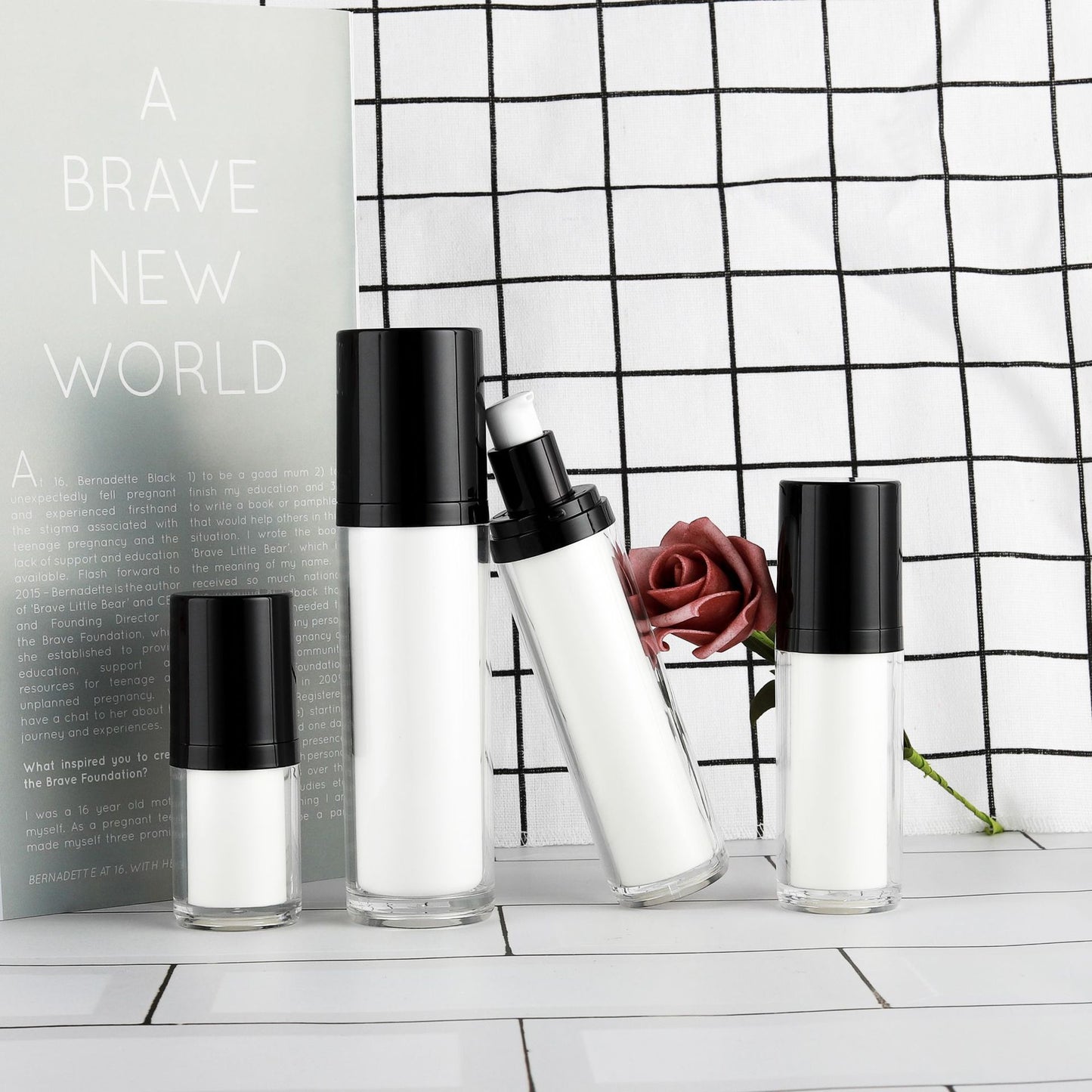 Black and white cylindrical bottle Vacuum cosmetic bottle