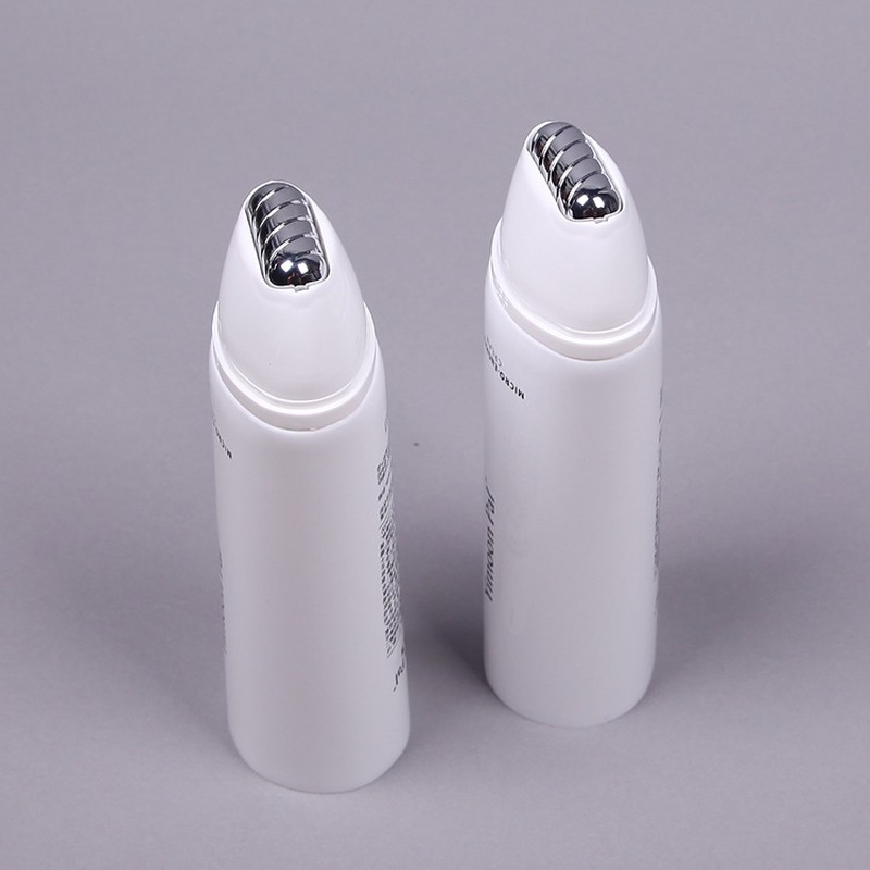 Body care cosmetic tube roller applicator